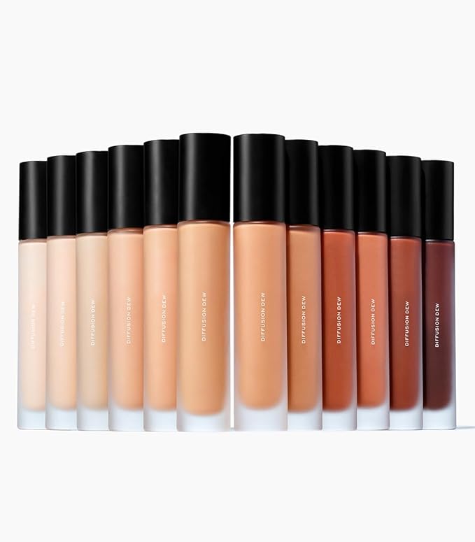 MAKE Beauty Diffusion Dew Skin Tint. Sheer to Medium Coverage Radiant Finish. Blurring, Smoothing, and Brightening for Glowing Complexion. Enhanced with Niacinamide and Adenosine. Suede 12