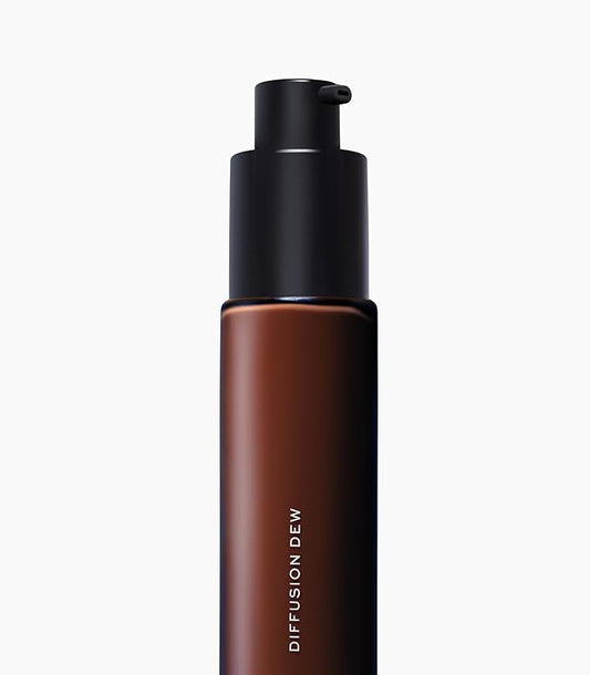 MAKE Beauty Diffusion Dew Skin Tint. Sheer to Medium Coverage Radiant Finish. Blurring, Smoothing, and Brightening for Glowing Complexion. Enhanced with Niacinamide and Adenosine. Espresso 20