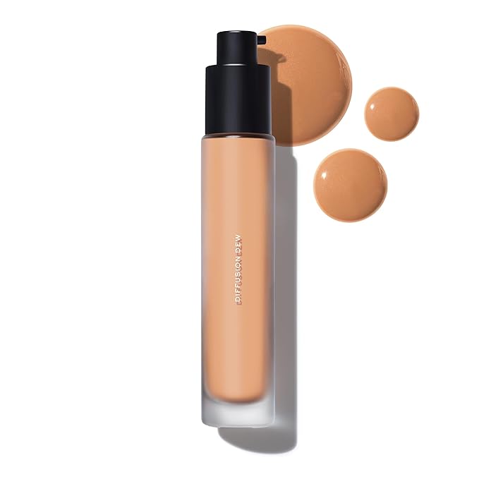 MAKE Beauty Diffusion Dew Skin Tint. Sheer to Medium Coverage Radiant Finish. Blurring, Smoothing, and Brightening for Glowing Complexion. Enhanced with Niacinamide and Adenosine. Caramel 08