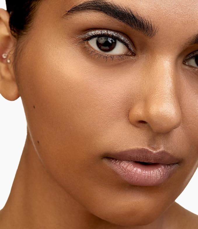 MAKE Beauty Diffusion Dew Skin Tint. Sheer to Medium Coverage Radiant Finish. Blurring, Smoothing, and Brightening for Glowing Complexion. Enhanced with Niacinamide and Adenosine. Caramel 08