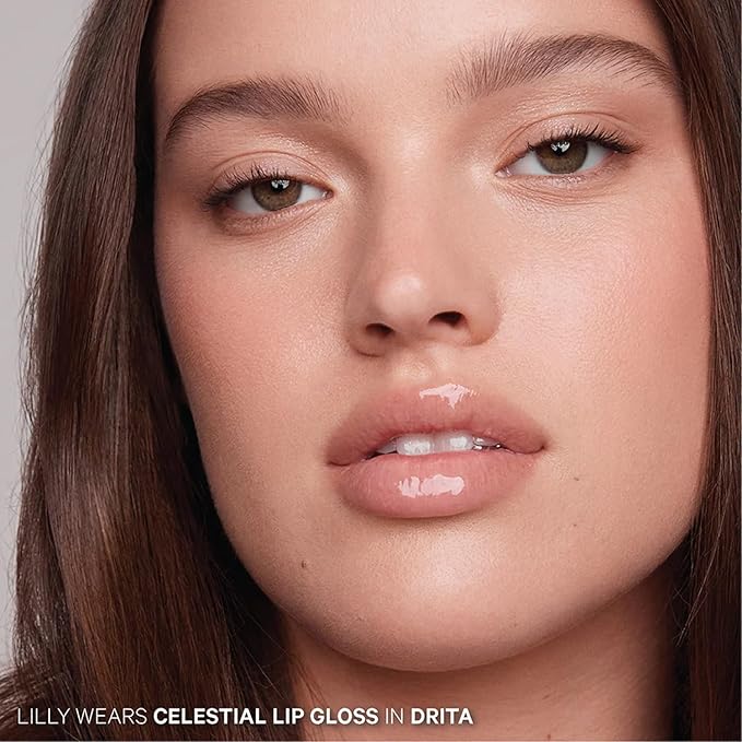 Kevyn Aucoin Celestial Lip Gloss, Drita (creamy sheer nude): Light reflecting shine & sheer. Precision makeup artist applicator. Hydrating, non-stick formula. Multi-dimensional 3D plumping effect.