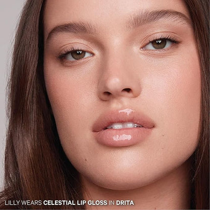 Kevyn Aucoin Celestial Lip Gloss, Drita (creamy sheer nude): Light reflecting shine & sheer. Precision makeup artist applicator. Hydrating, non-stick formula. Multi-dimensional 3D plumping effect.