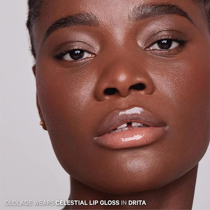 Kevyn Aucoin Celestial Lip Gloss, Drita (creamy sheer nude): Light reflecting shine & sheer. Precision makeup artist applicator. Hydrating, non-stick formula. Multi-dimensional 3D plumping effect.